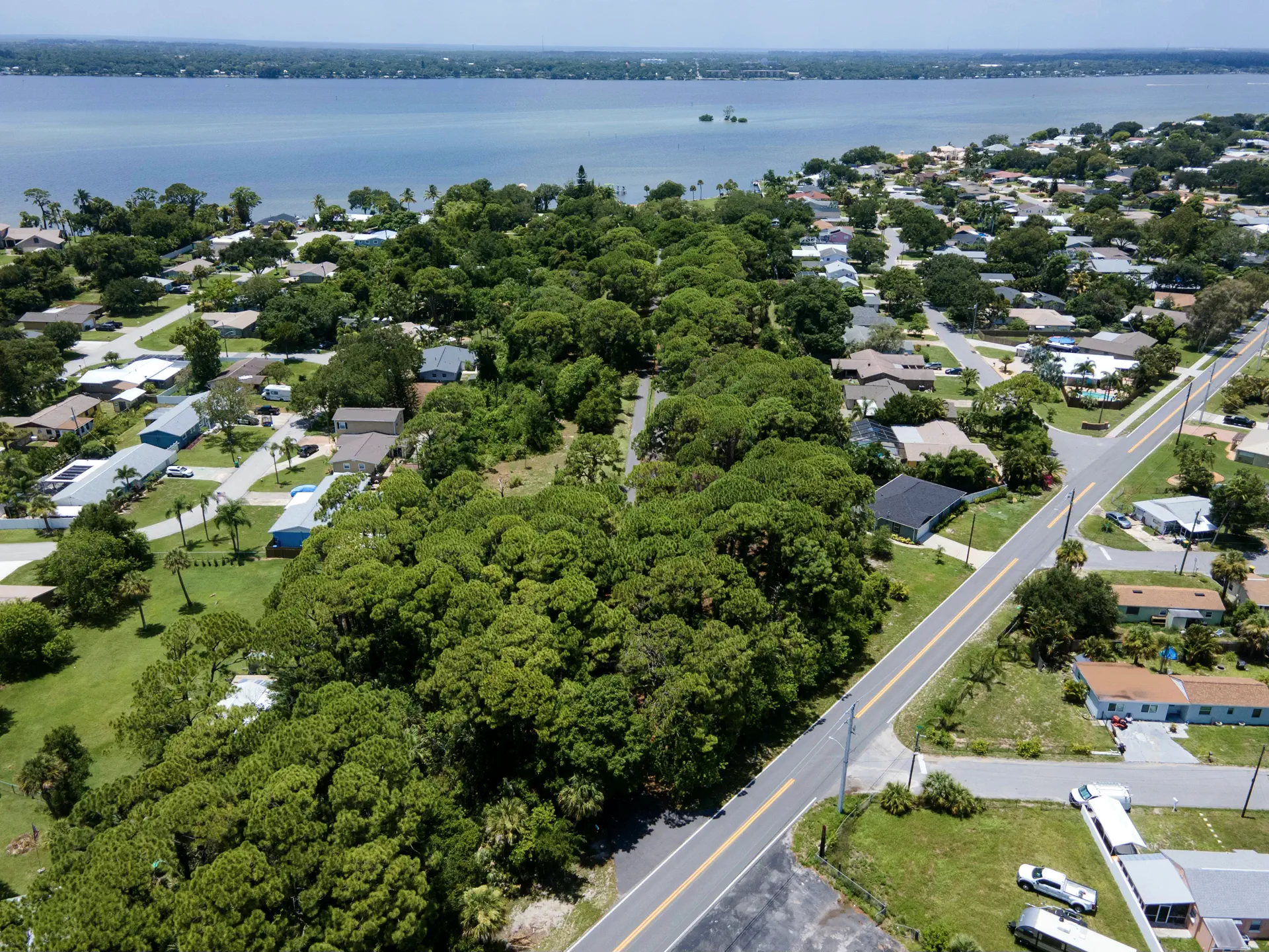 Aerial view of a tree-lined Space Coast neighborhood